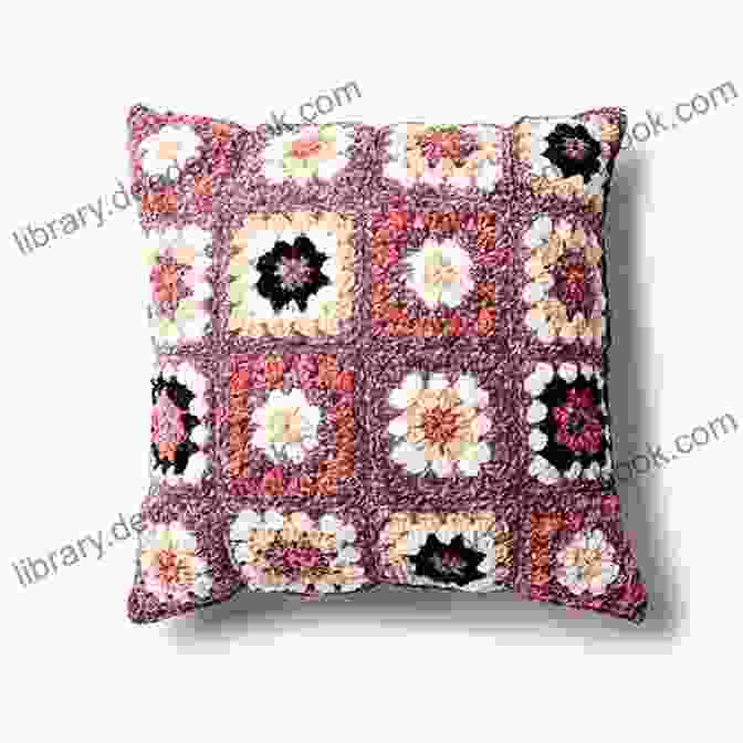 A Granny Square Pillow Made With A Solid Color Granny Squares: 20 Crochet Projects With A Vintage Vibe