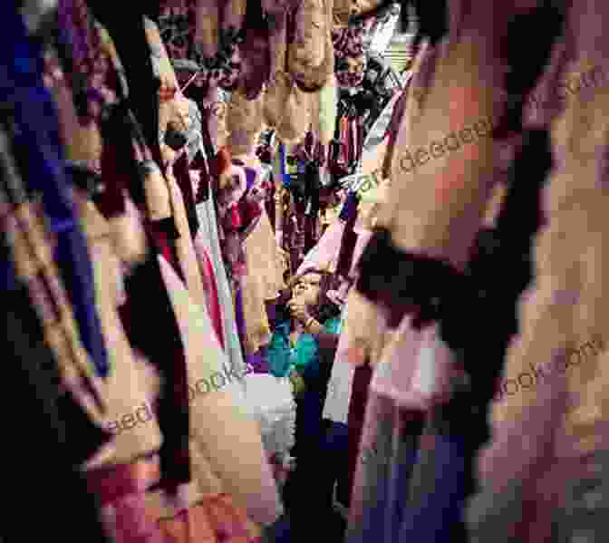 A Person Searches Through A Crowded Costume Shop Have You Seen My Costume For Halloween?